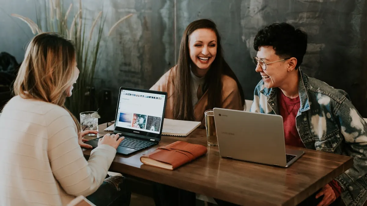People collaborating on laptops with simple everyday software