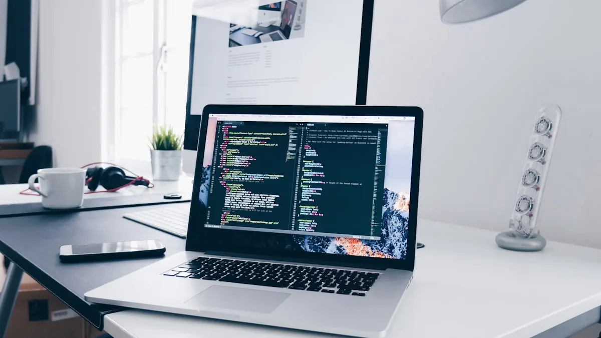 Laptop open on a tidy home desk while checking startup programs